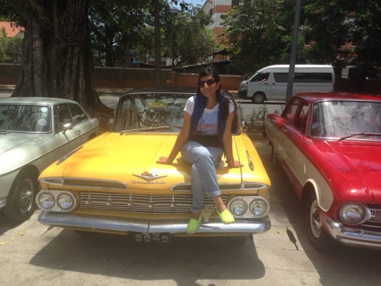 Dhara amongst a bevy of period vintage cars in Sri Lanka. The film used a mind boggling 200 vintage cars in the film. Photo courtesy: Dhara Jain